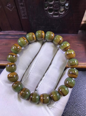 和田玉东北籽料析木椴树林河磨玉四色一线天老形手链46克厂家直销