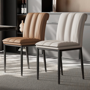 意式极简马鞍皮餐椅轻奢高级感北欧书桌椅化妆椅扶手酒店餐厅椅子