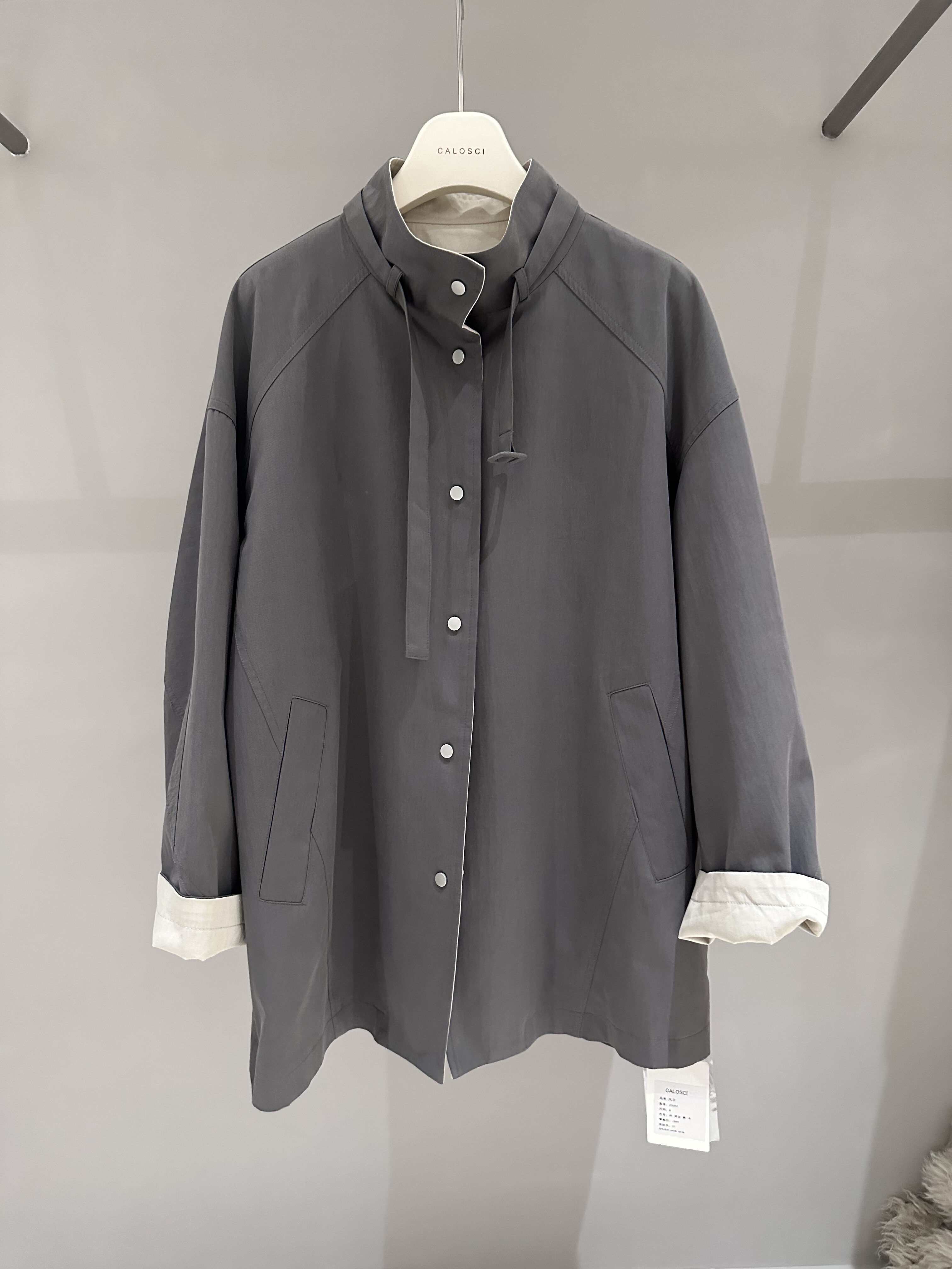 韩国CALOSCI时尚设计感中长款撞色立领领口抽绳单排扣风衣外套