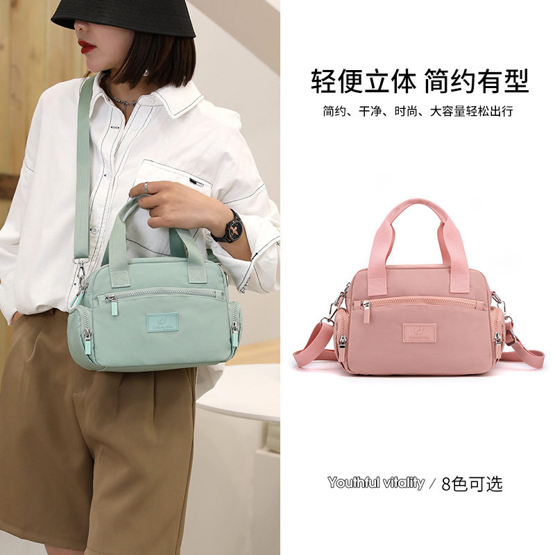 女包包新款 大容量防水斜挎包 简约时尚手提包尼龙女包妈妈包