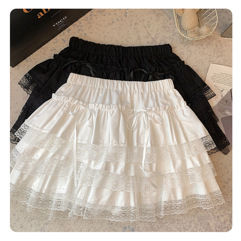 白色蛋糕半身裙蕾丝蓬蓬纯欲2025夏季新款防走光a字小个子黑短裙