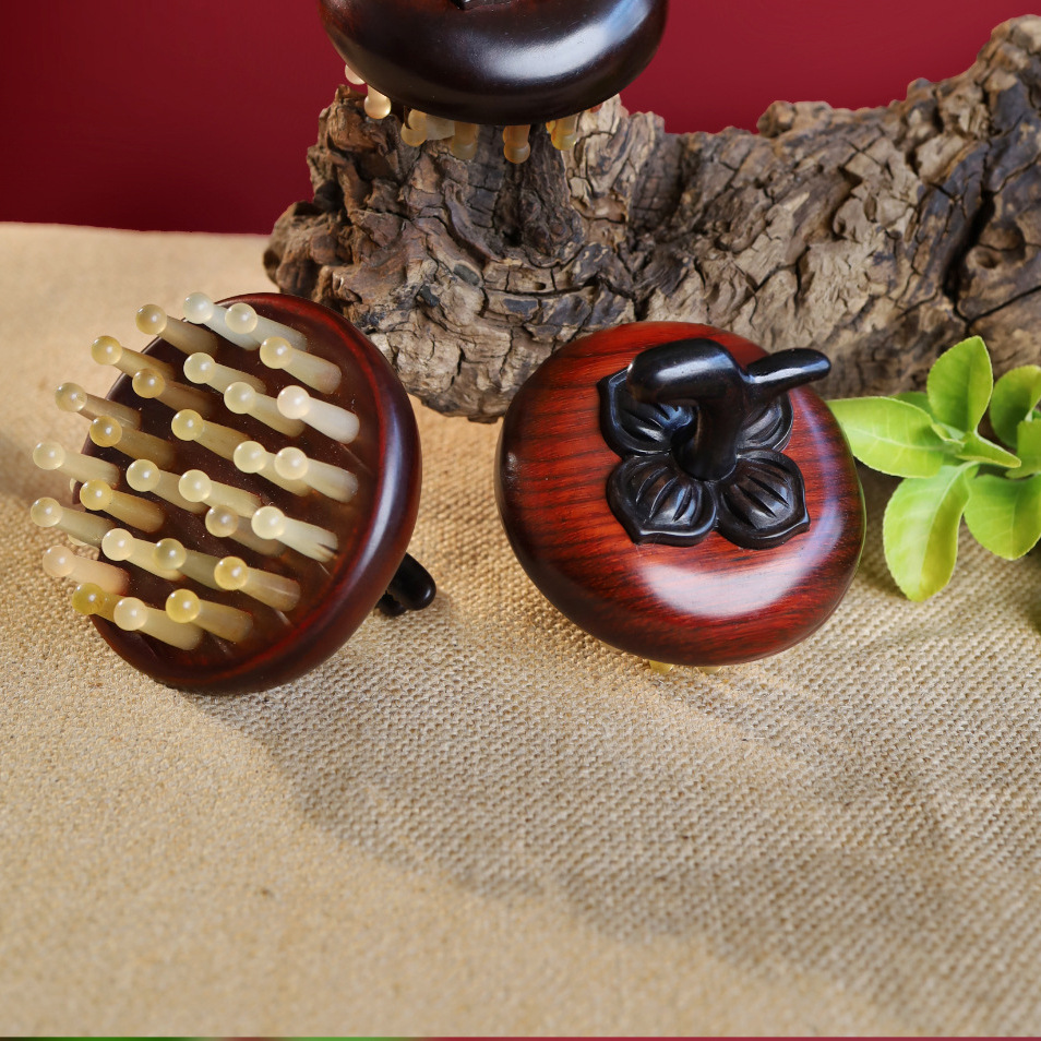 柿子按摩梳紫檀羊角梳头部