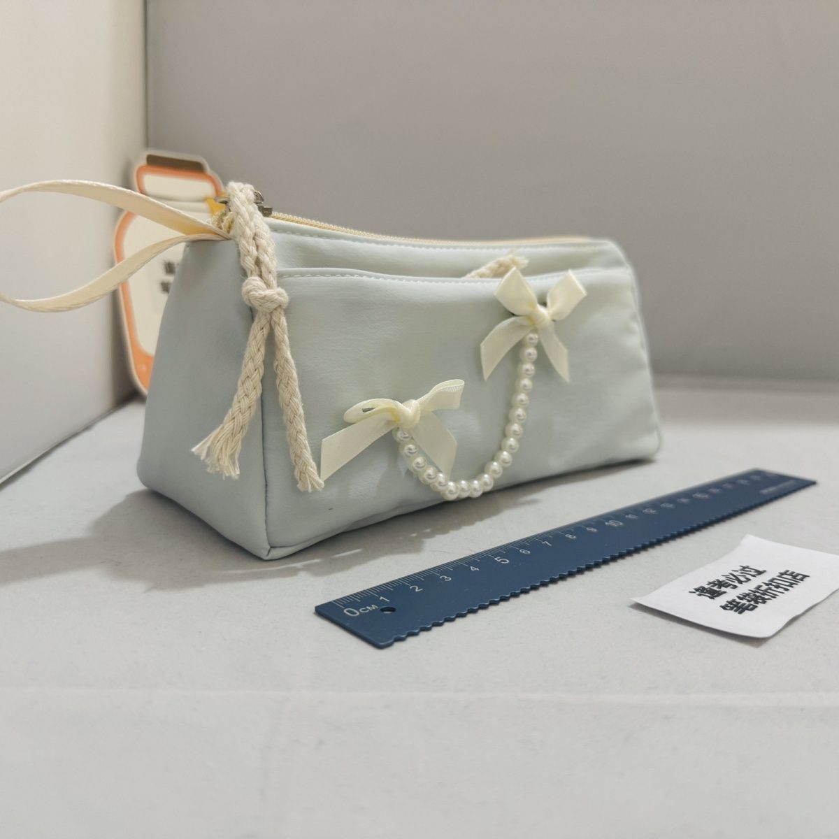 【Bolor正品】甜美蝴蝶结珍珠笔袋女学生文具盒流苏装饰简约收纳图片