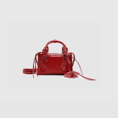 UR国内代购2026春季新款女士气质金属扣饰手提斜挎包UAYB60024