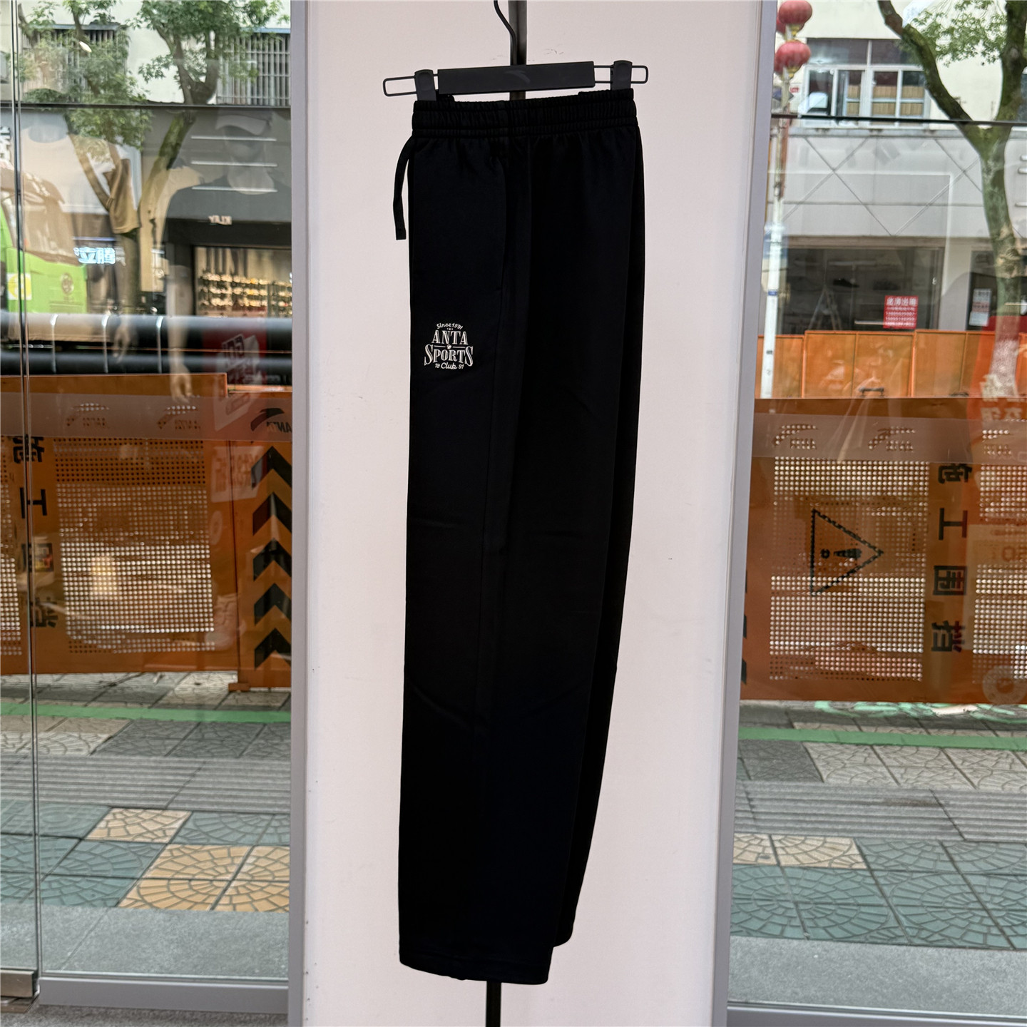 安踏男卫裤2026新款简约百搭宽松直筒针织运动长裤子152638307N