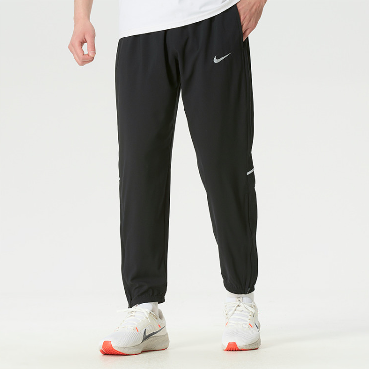正品Nike耐克纯色速干透气轻薄收束腿拉链男裤运动休闲梭织长裤