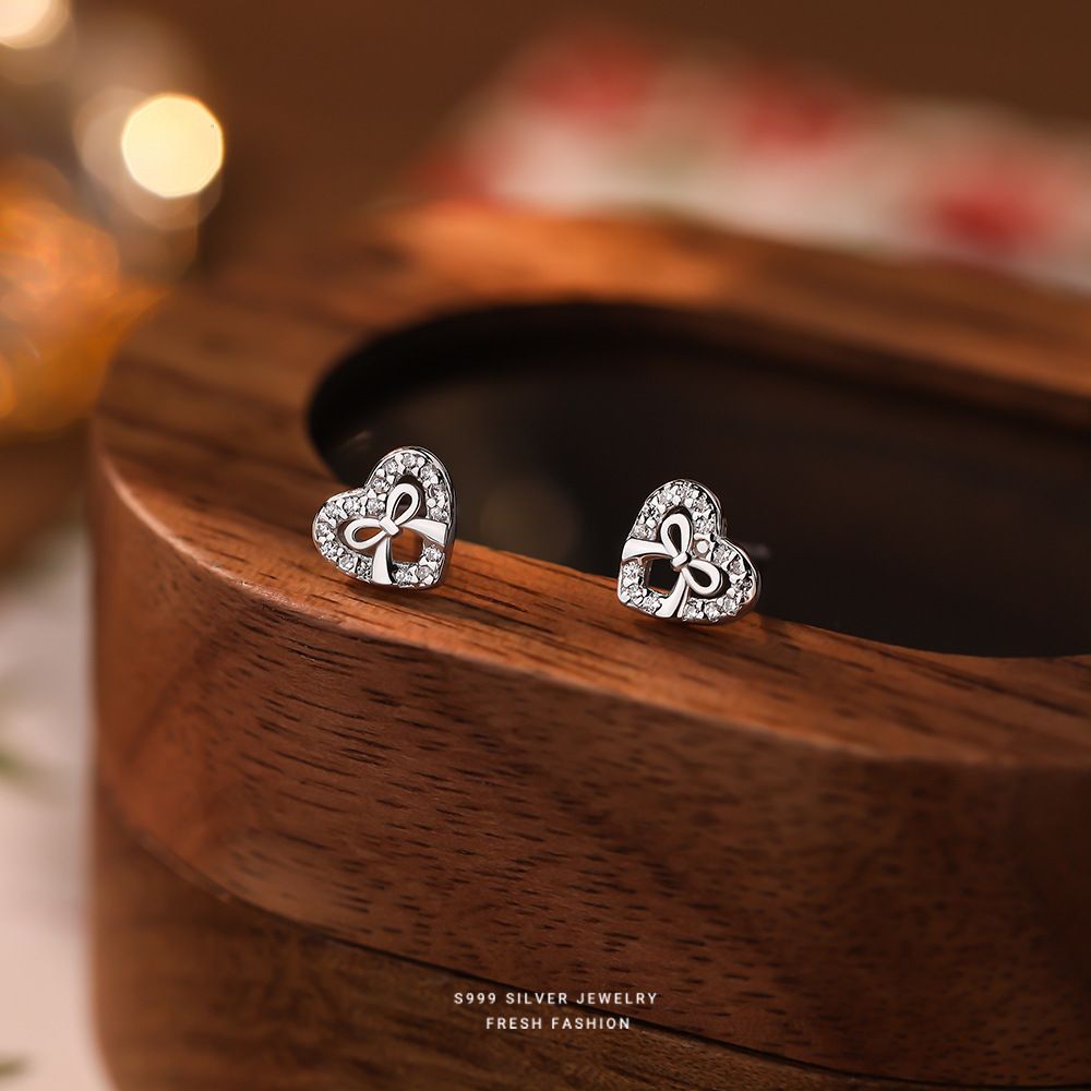 镂空爱心蝴蝶结耳钉女s999纯银轻奢百搭甜美足银微镶学生耳饰