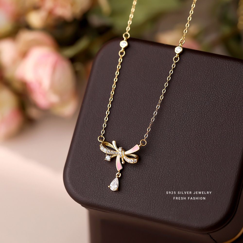 S925纯银夜光胶蝴蝶结项链女粉色渐变滴胶荧光气质小清新锁骨链