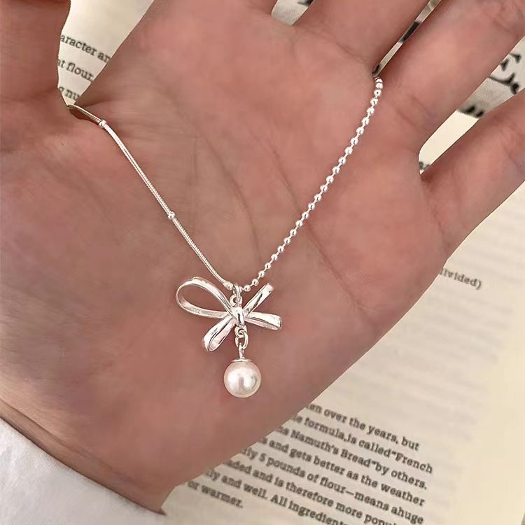 s990纯银蝴蝶结珍珠项链女轻奢高级感小众秋冬气质小众毛衣锁骨链