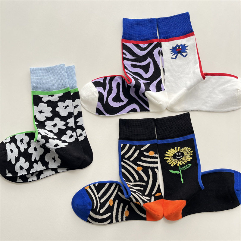 秋冬新款卡通提花AB袜子女韩版时尚拼色花朵中筒袜线条无骨棉袜