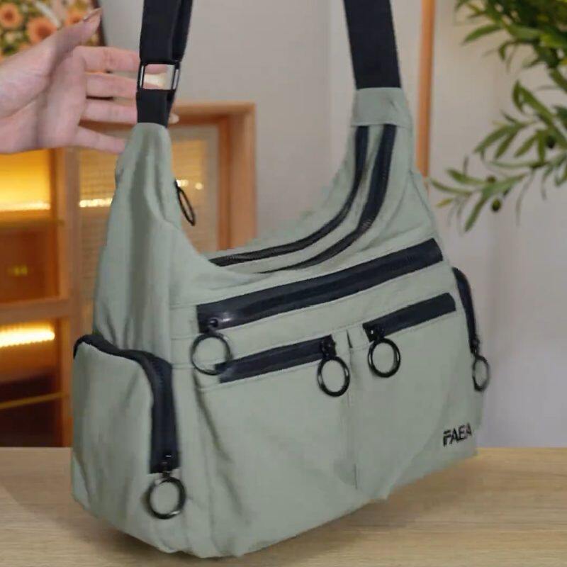 2026双层多拉链袋防泼水尼龙布纯色男女单肩斜挎11寸平板伞杂志包