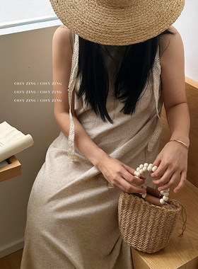 cosyzing包包夏季新款海边沙滩草编包木珠手提圆筒水桶包斜跨小包