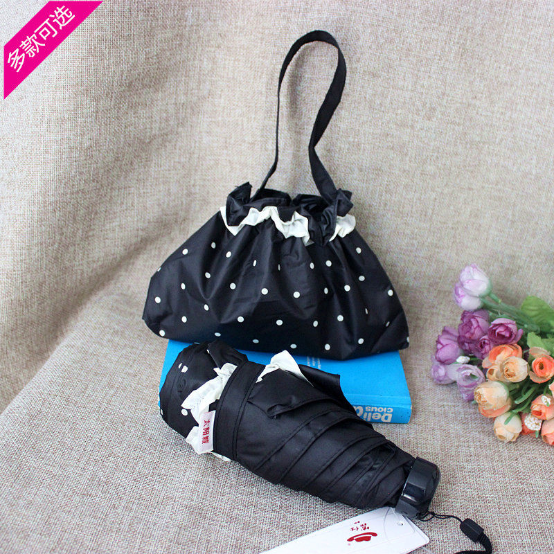 太阳城手提包伞拎包小巧便携太阳伞女黑胶防晒波点花边黑色遮阳伞