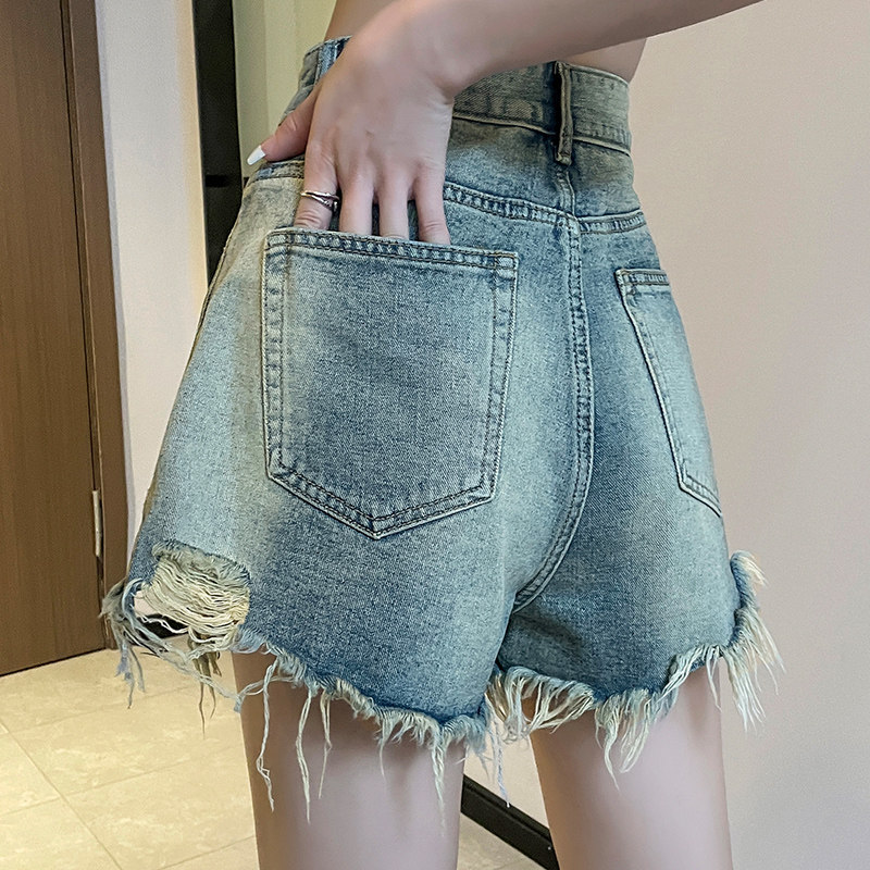 牛仔短裤女破洞裤子梨型遮胯a版图片