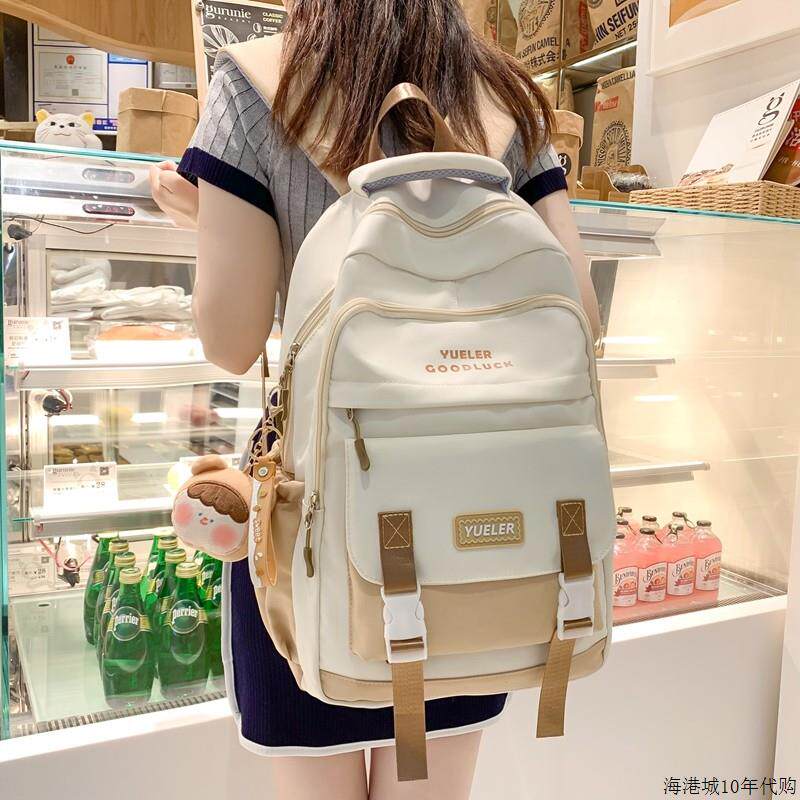 书包初中女生小学生三到六年级减负护脊超轻便大容量高中生双肩包