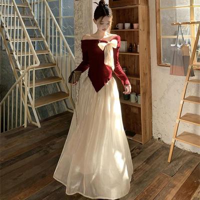 千金风时尚套装一字肩蝴蝶结不规则长袖针织衫高腰遮肉网纱半身裙