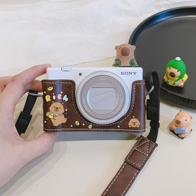 咖色元宝卡皮巴拉相机底座保护套