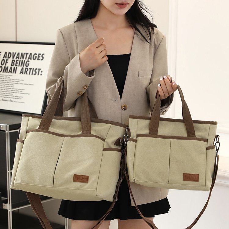新款手提帆布包女2025新款大容量单肩包百搭通勤托特包休闲斜挎