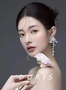 满钻蝴蝶结长款流苏夸张耳环