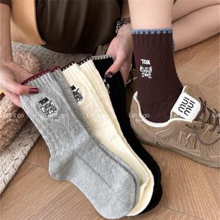 秋冬加厚粗针织麻花拼色刺绣堆堆袜欧货卡通潮袜不对称麻花中筒袜