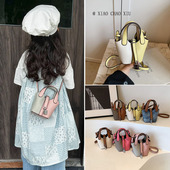 儿童包包2024新款 撞色女童宝宝手提水桶包公主外出配饰斜挎包 时尚