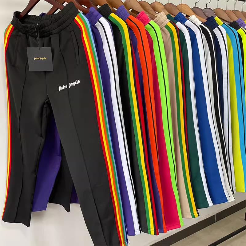 PALM字母印花侧边条纹运动长裤子