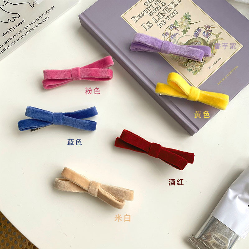 少女心甜美风侧边夹丝绒蝴蝶结