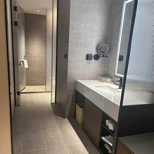 SPC石晶仿瓷墙板亚朵维也纳水磨石淋浴间仿瓷雕刻无缝拼接岩晶板