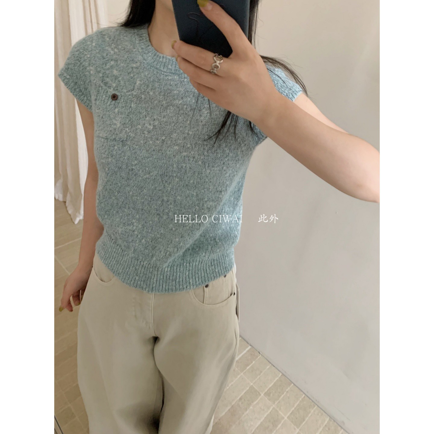 此外 休闲风女装毛针织衫潮流款韩系休闲圆领花线单口袋短袖上衣图片