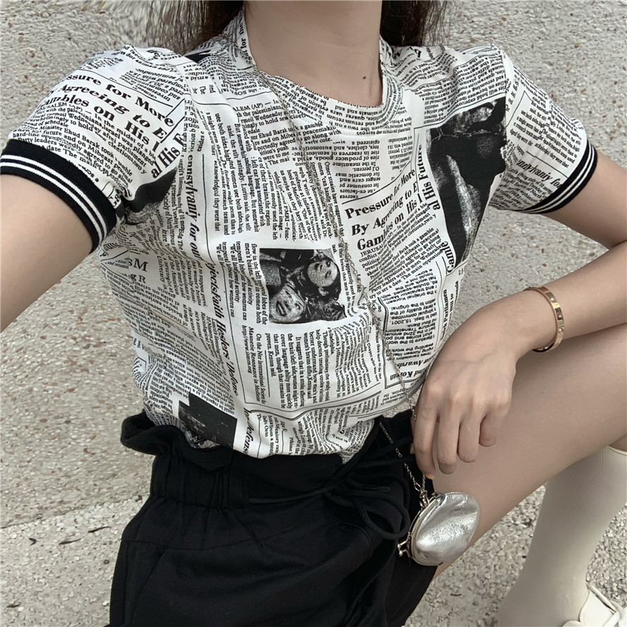 Real newspaper set 2021 new T-shirt shows thin female design sense short sleeve loose minority flower bud short skirt