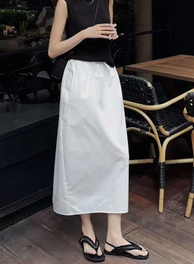 休闲日系白色半身裙女2026夏季新款松紧腰抽绳花苞裙后开叉中长裙