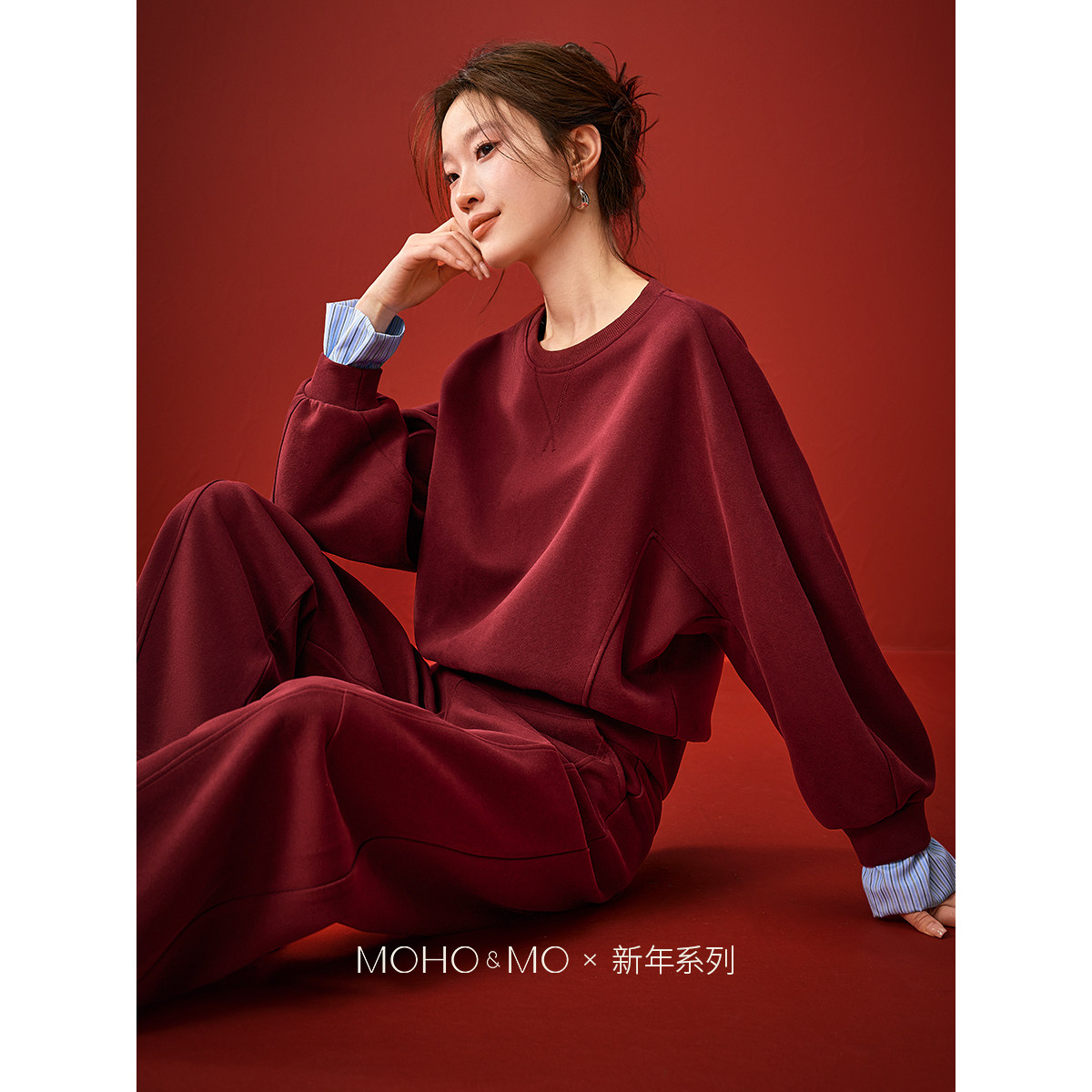 沫晗依美圆领卫衣弯刀裤套装