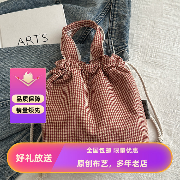 手提上班杂物包女怀旧格子帆布中号通勤百搭束口袋小拎包2026新款