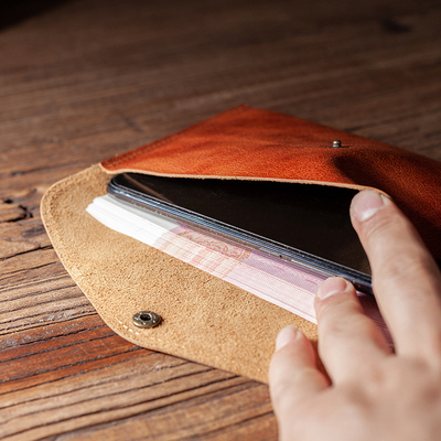 真皮手拿钱包手机包顽皮老人