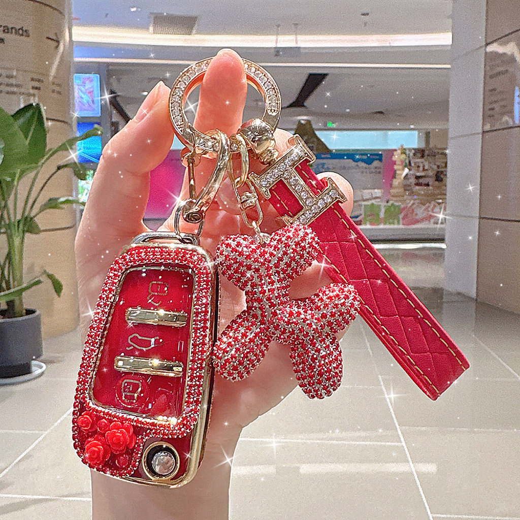 适用于奥迪q2l钥匙套a1/a3/a6折叠扣贴钻包q3轿跑扣q7tt女士贴花