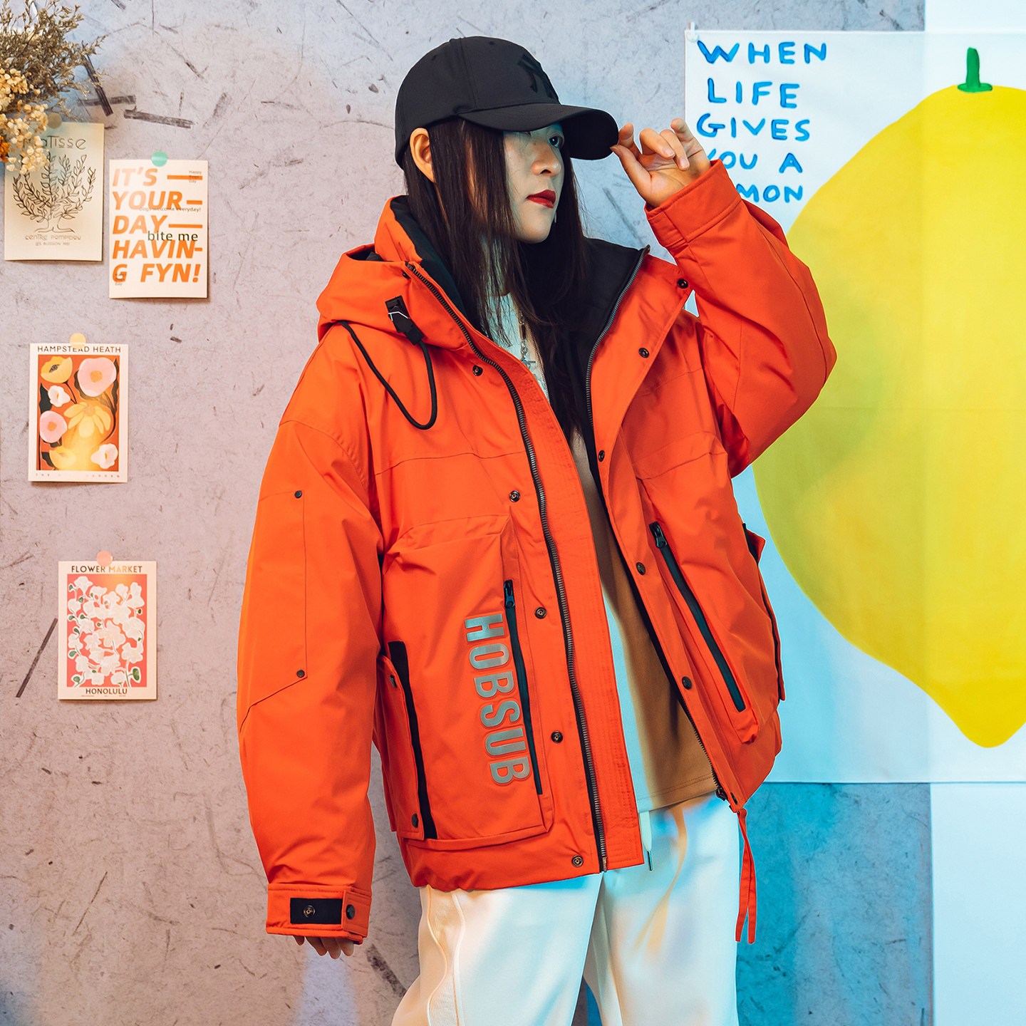 2025冬装潮牌橙色口袋字母背带式羽绒服鸭绒外套男女宽松大码情侣