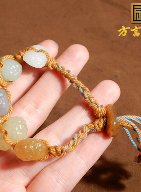 新疆黄口糖烟紫随型多宝手串