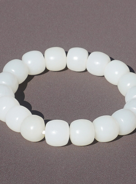 新疆留皮孔细腻羊脂白玉籽手串