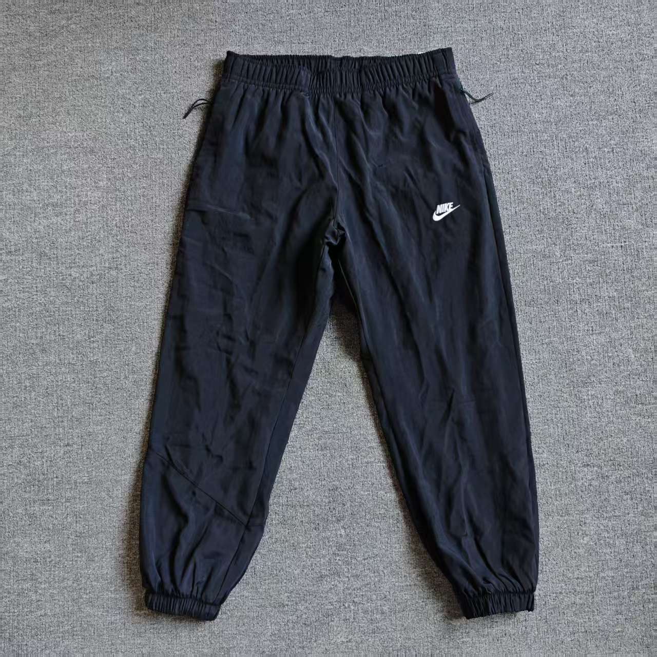 NIKE耐克男子冬款加厚摇粒绒内衬刺绣LOGO经典收脚长裤FB8617-010