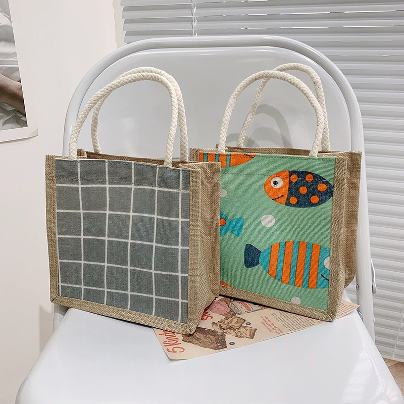 日韩女手提包包原创简约麻布潮卡通文艺手拎零食袋环保饭盒包包