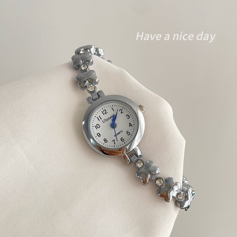 花瓣水钻链条女士手表轻奢小表盘