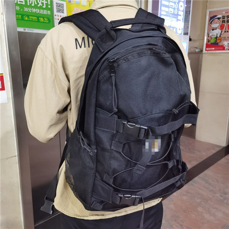 抽绳双肩背包工装书包