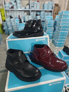 品牌斯乃纳撤柜男女童秋冬薄绒靴马丁靴真皮单靴童鞋防滑儿童短靴