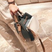 潮韩撞色水桶包女2017秋冬新款时尚流苏手提单肩包撞色百搭斜挎包