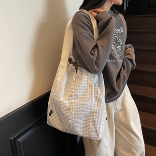 轻便运动双肩包女抽绳口袋多用手提斜挎包旅行背包女款学生书包