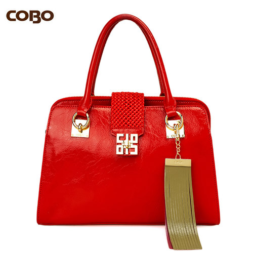 COBO/蔻尔宝头层牛皮时尚女包手提单肩斜挎流苏真皮包