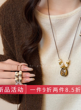 金色虎眼石土星串珠项链女秋冬新款长款抽拉毛衣链小众设计感配饰