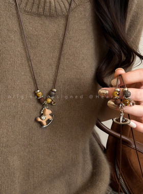咖色小马串珠抽拉项链女秋冬美拉德气质长款毛衣链百搭本命年配饰
