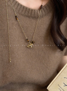 复古虎眼石小马项链女2025新款轻奢小众毛衣链秋冬长款本命年配饰