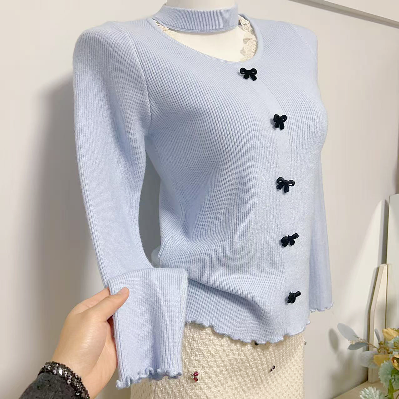 法式甜美风蝴蝶结排扣针织衫